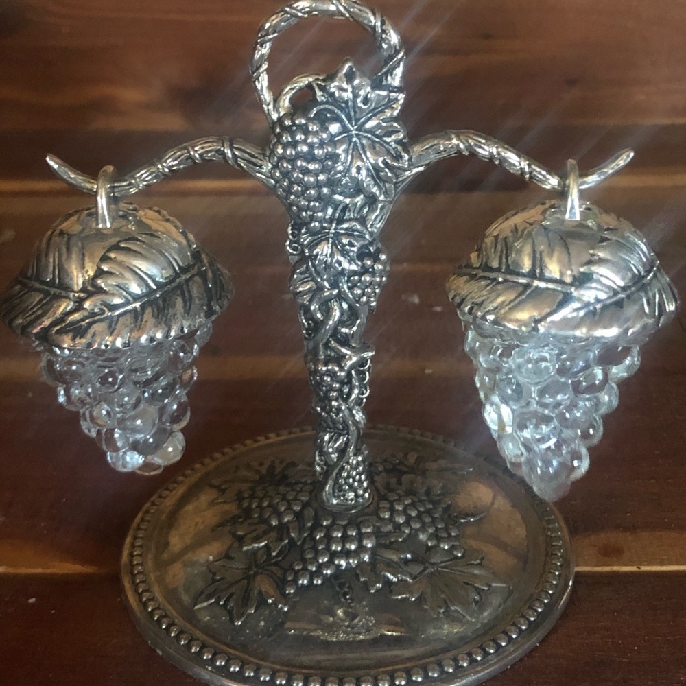 Silver salt and pepper shaker.  Grape design